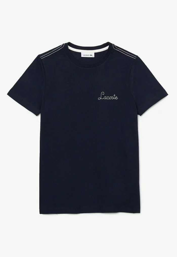 LACOSTE FEMME - T-shirt Imprimé - Bleu Marine Blanc 1 LACOSTE FEMME - T-shirt Imprimé - Bleu Marine Blanc