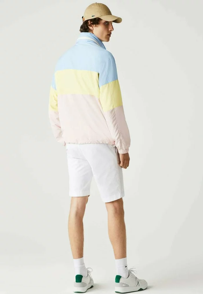 Lacoste BH8063 - Veste Mi-saison - Bleu / Jaune / Rose Pale 2 Lacoste BH8063 - Veste Mi-saison - Bleu / Jaune / Rose Pale – Image 2