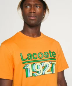 Lacoste T-shirt Imprimé - Fango 9 Lacoste T-shirt Imprimé - Fango -Lacoste Soldes Magasin 4a871434ef6544c781802bc51bbe7704