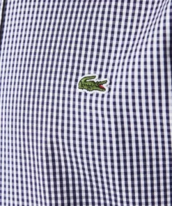 LACOSTE - Chemise - Blanc / Bleu Marine -Lacoste Soldes Magasin 55d8610e9ba44bee98345ec657e5ee63