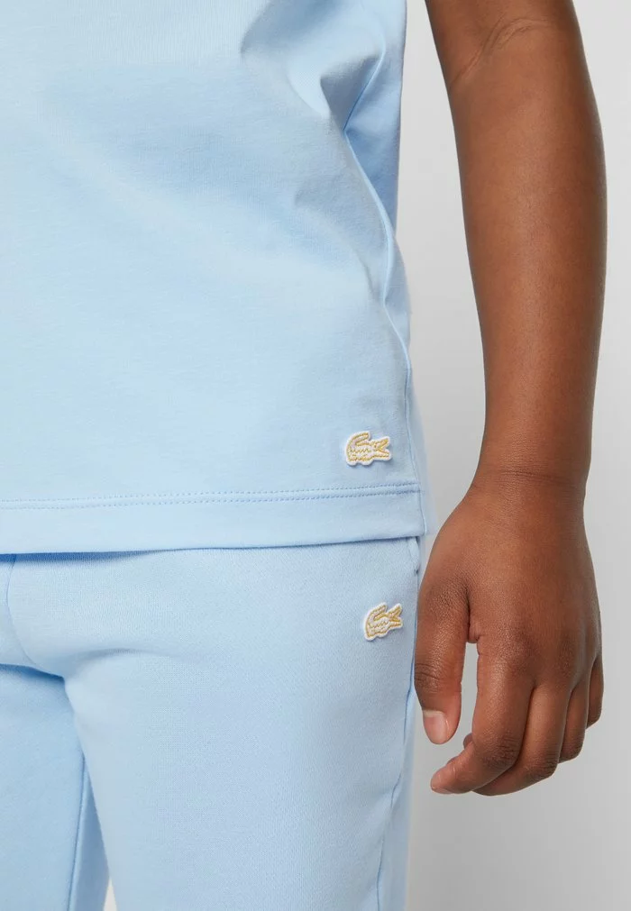 Lacoste UNISEX EXCLUSIVE - T-shirt Imprimé - Light Blue 6 Lacoste UNISEX EXCLUSIVE - T-shirt Imprimé - Light Blue – Image 6