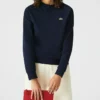 Lacoste Pochette - Allover Embossed Rouge