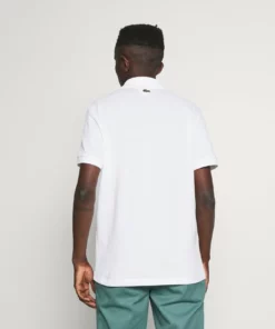 Lacoste Polo - Blanc 8 Lacoste Polo - Blanc -Lacoste Soldes Magasin c83b89d041124951aaed398e16930776