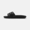 Lacoste CROCO SLIDE - Mules - Black